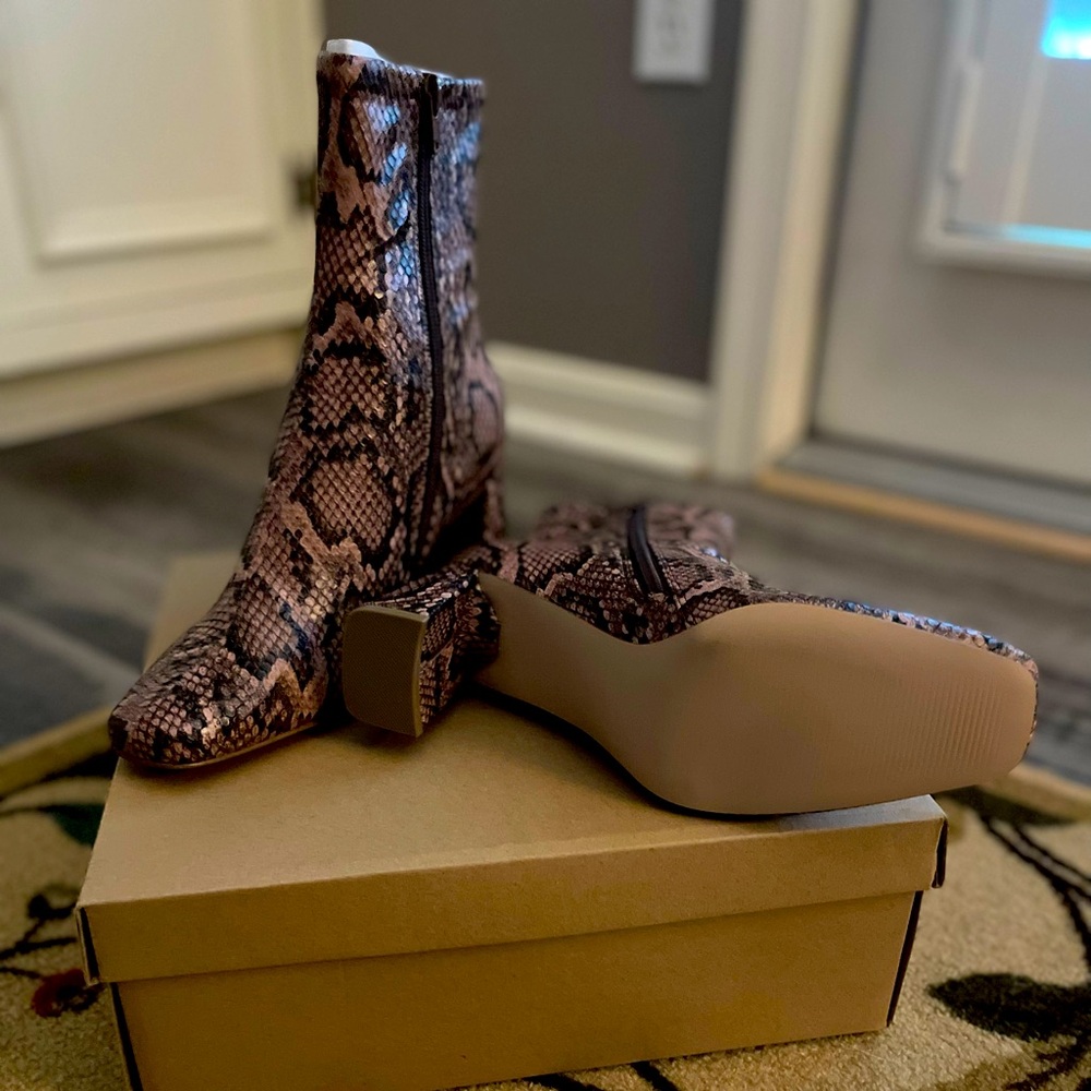 Steve Madden pink snake skin booties. Never been worn